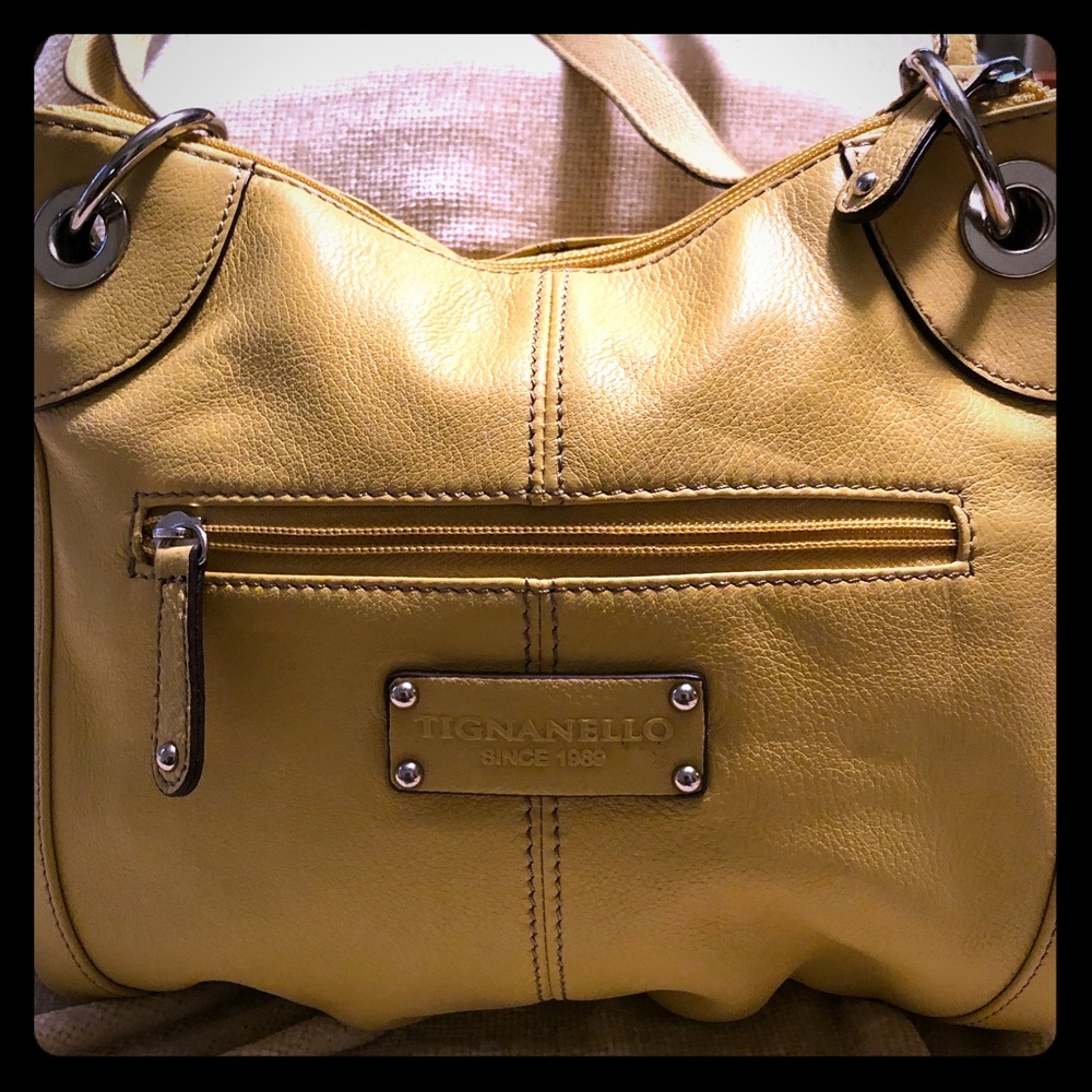 Tignanello handbag in yellow.